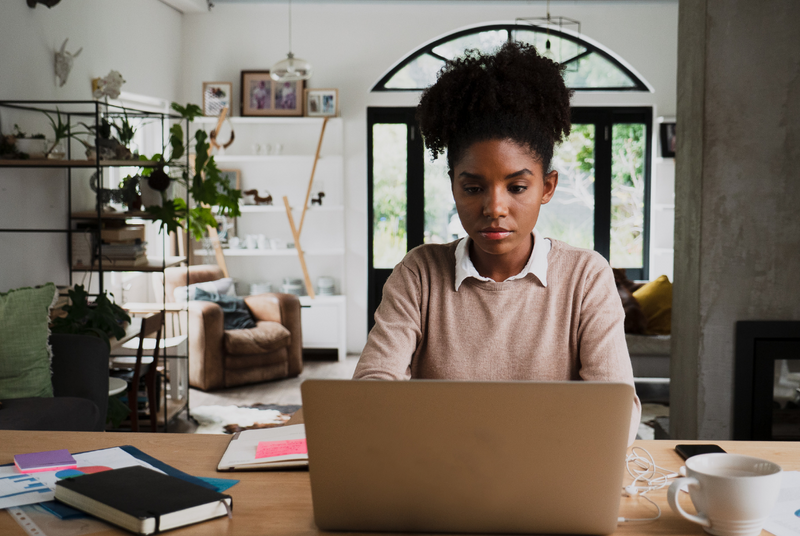 young woman studying GMAT practice questions