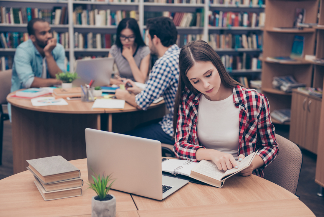 student studying for different sections of the GRE